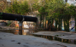 drainage canal with graffiti